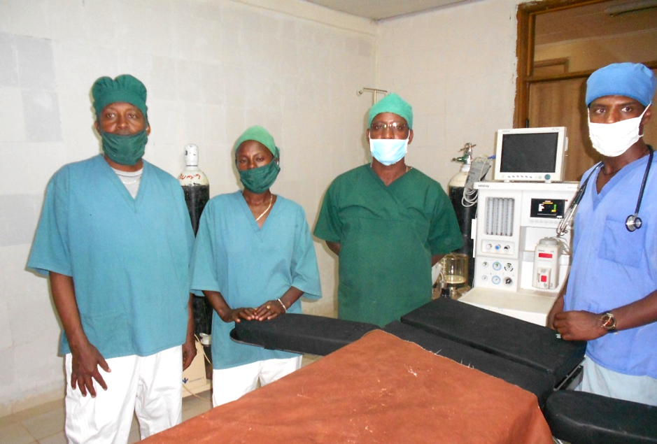 Four health care providers in masks