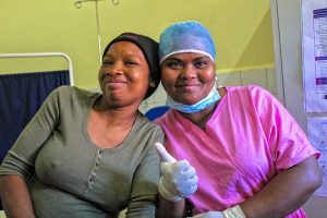 Two women smiling