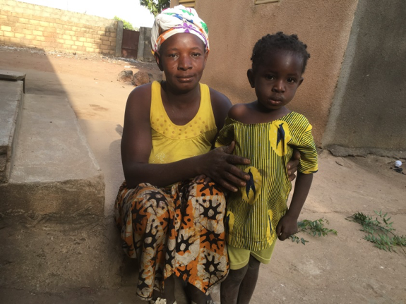 Woman sitting with daughter