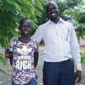 Father and son standing