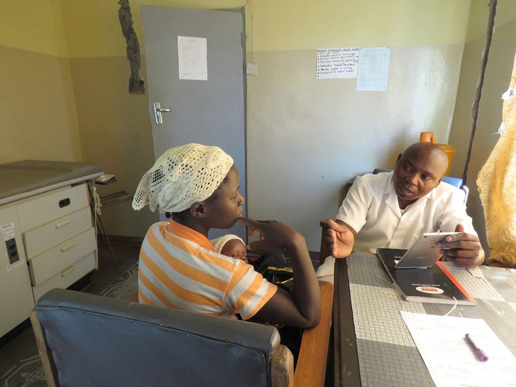 Man and woman sitting and talking