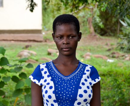 Head shot of woman standing