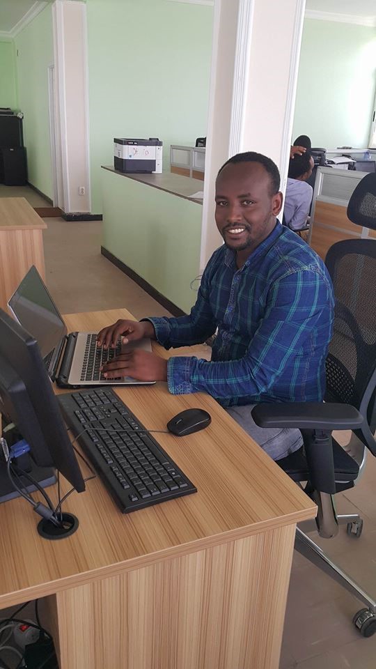 Man sitting at computer