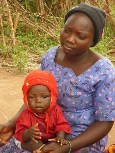 Woman sitting with male child