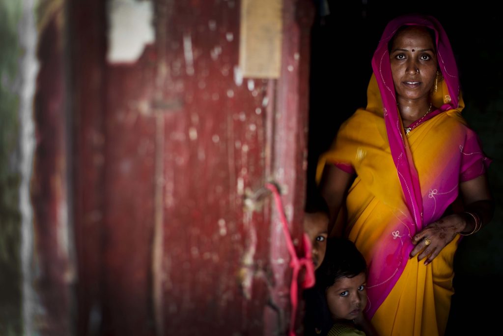Woman and Child standing in doorway