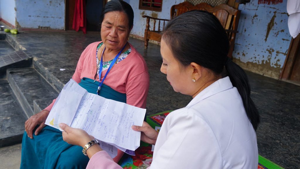 Ranita discusses test results with a client.